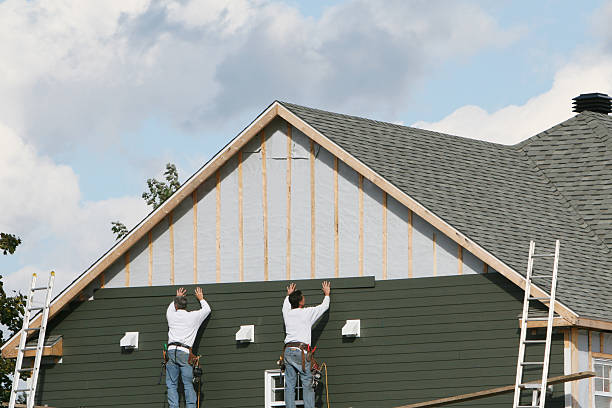 Professional Storm Damage Siding Repair technician working in Royersford, PA